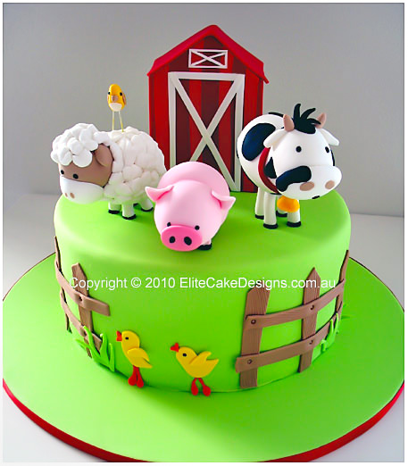 Farm animals in a barn yard birthday cake